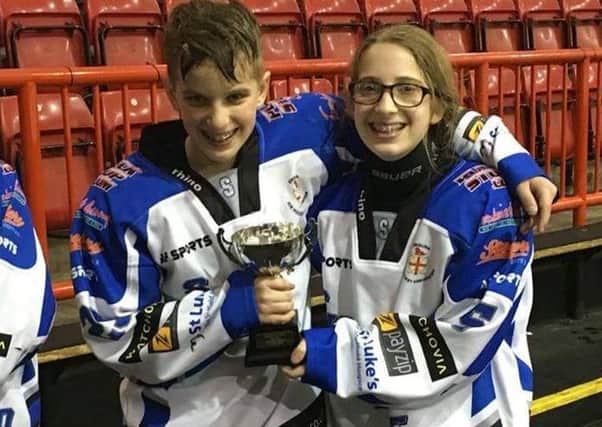 Martha with her brother and fellow ice hockey player Isaac EMN-160627-085402002