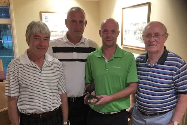 Mens captain Graham Sykes (left) with Grouse Foursomes winners Nick Dawson, Dave Foxon and sponsor John King (right) EMN-160627-103211002