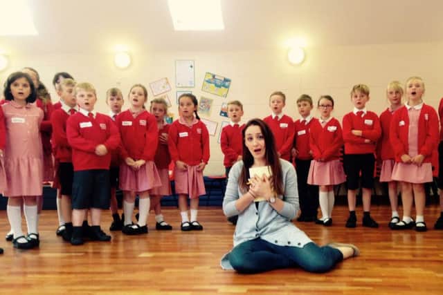 Pupils from Huttoft Primary School with Natalie Montakhab, soprano in Garsington Opera Choir
