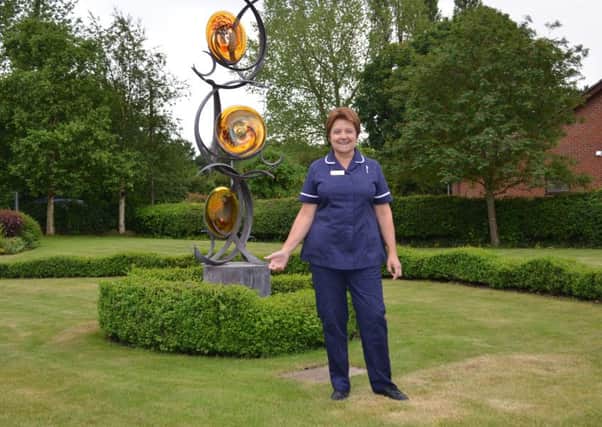 Senior Nurse Chris Dyer is retiring from Lindsey Lodge Hospice after 21 years service. EMN-160628-164732001