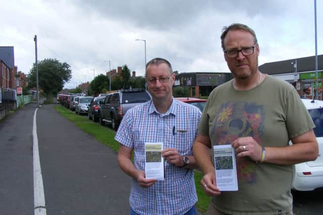 Seeking suport for a residents' parking scheme on Grantham Road, Simon Jones and Calvin Orley. EMN-161107-185946001