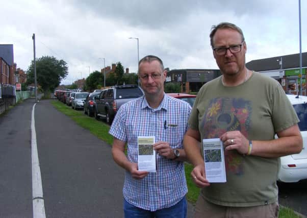 Seeking suport for a residents' parking scheme on Grantham Road, Simon Jones and Calvin Orley. EMN-161107-185946001