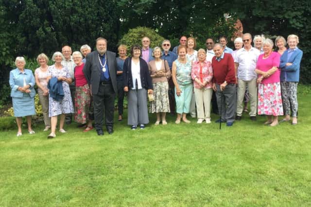 Guests gathered at the Sleaford Twinning Association garden party. EMN-161107-191105001