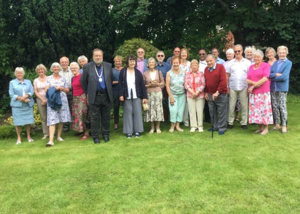 Guests gathered at the Sleaford Twinning Association garden party. EMN-161107-191105001