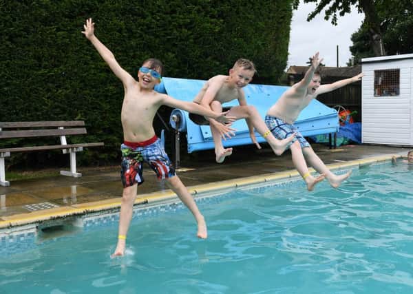 Metheringham swimming Pool opening day celebrations. L-R Ethan Bellamy 10, Billy Shaw 10 and Harry Shaw 12. EMN-161107-110723001