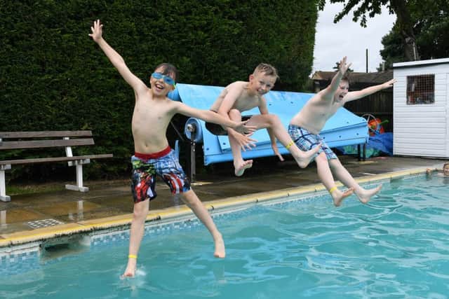 Metheringham swimming Pool opening day celebrations. L-R Ethan Bellamy 10, Billy Shaw 10 and Harry Shaw 12. EMN-161107-110723001