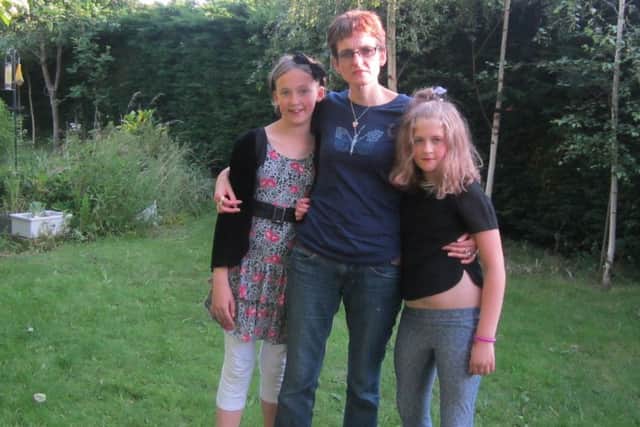 Emma Parker with daughters Charlotte and Melissa. ANL-160407-142629001