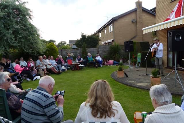 Canadian country singer Ryan Cook performs his garden concert at Silk Willoughby. EMN-161107-190210001
