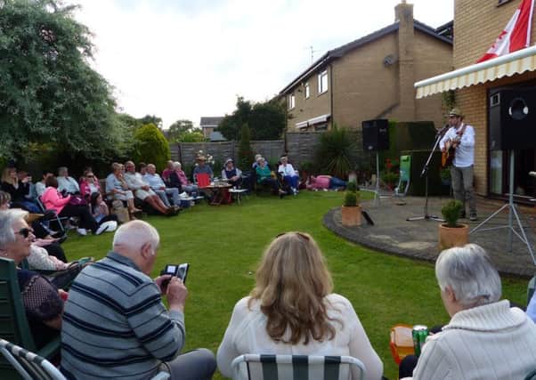 Canadian country singer Ryan Cook performs his garden concert at Silk Willoughby. EMN-161107-190210001