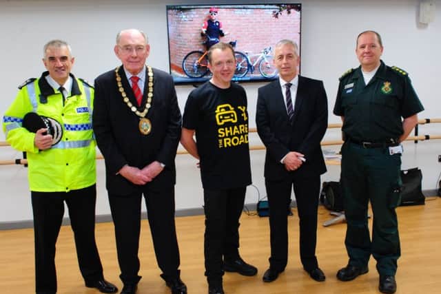 At the launch of the cycle safety video. From left - Lincolnshire Police Chief Constable Neil Rhodes, Coun John Money (Chairman of NKDC), Phil Crow, John Siddle (Lincolnshire Road Ssafety Partnership) and Steve Pratten (East Midlands Ambulance Service). EMN-160507-165602001
