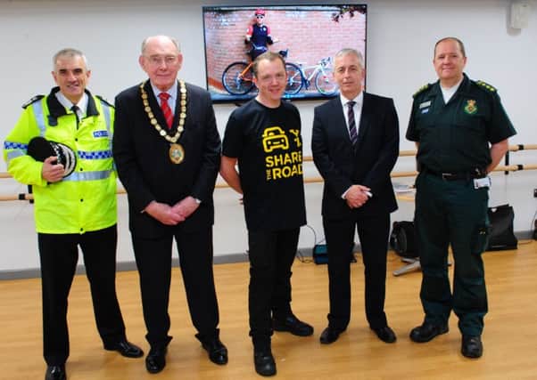 At the launch of the cycle safety video. From left - Lincolnshire Police Chief Constable Neil Rhodes, Coun John Money (Chairman of NKDC), Phil Crow, John Siddle (Lincolnshire Road Ssafety Partnership) and Steve Pratten (East Midlands Ambulance Service). EMN-160507-165602001