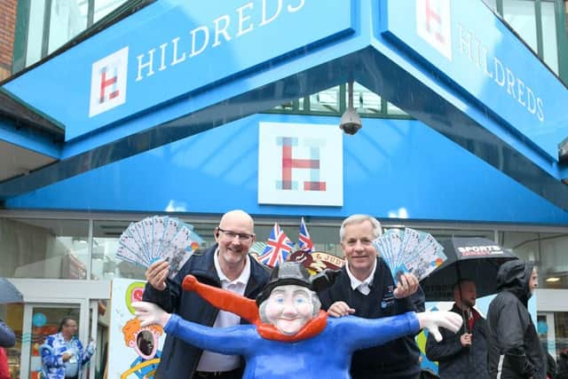 The Hildreds Shopping Centre rebrand launch. Pictured security officer Stephen Brewster (left) and centre manager Steve Andrews with the centre's spruced up Jolly Fisherman.