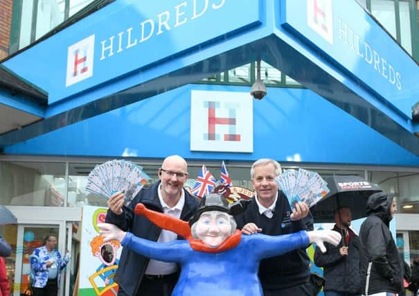 The Hildreds Shopping Centre rebrand launch. Pictured security officer Stephen Brewster (left) and centre manager Steve Andrews with the centre's spruced up Jolly Fisherman.