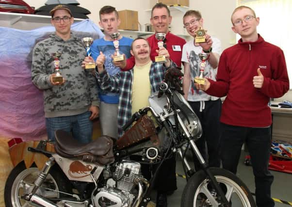 Linkage College students with their winning custom-built motorbike. ANL-160607-155846001