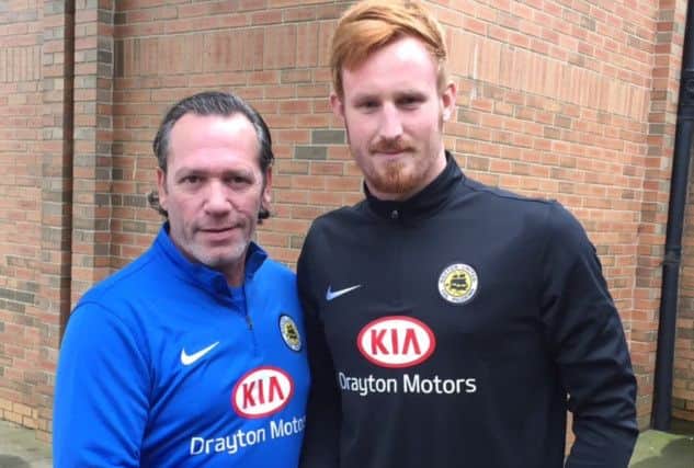 Christian Dibble with Boston United boss Dennis Greene.