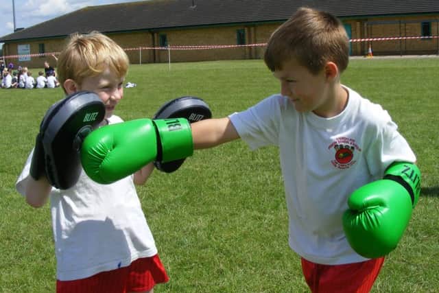 Kirkby La Thorpe pupils Oliver and Asher do battle in boxercise sessions. EMN-160607-145939001