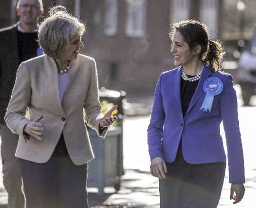 Victoria Atkins (right) with Theresa May EMN-160627-151905001