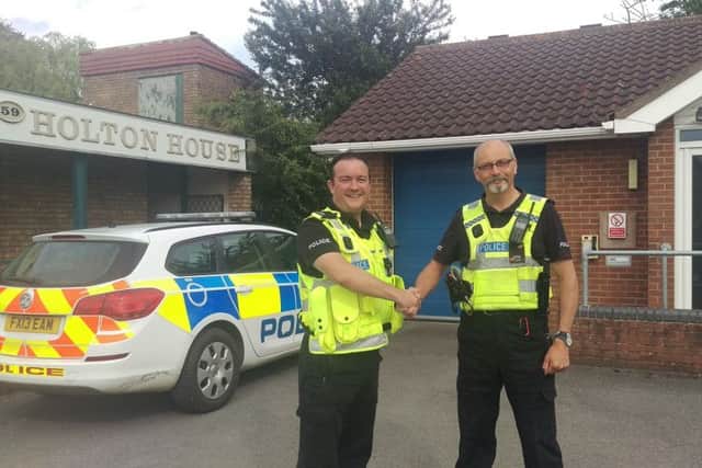 PC Rich Precious with PC Ian Clark outside the Louth Rural police station in Holton le Clay.