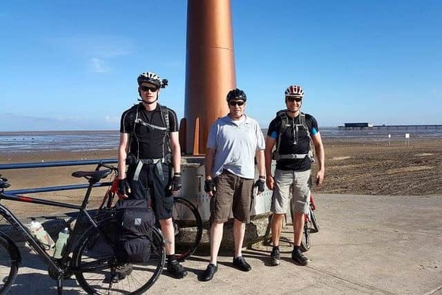 Tom Plumb, Simon Plumb and Richard Burkitt in Southport before departing on their 240 mile bike ride. _pzKq8dR5pBXPty38qDi