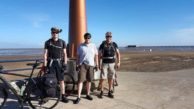 Tom Plumb, Simon Plumb and Richard Burkitt in Southport before departing on their 240 mile bike ride. _pzKq8dR5pBXPty38qDi