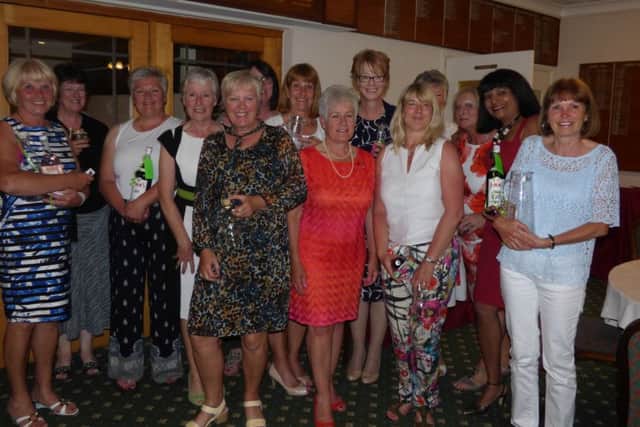 Lady Captain Helen Grinham with the winners.