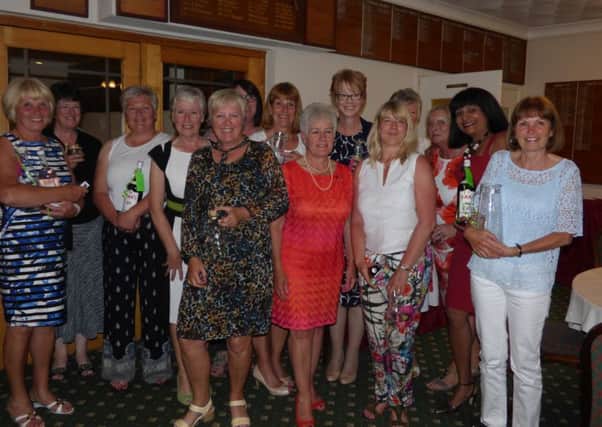Lady Captain Helen Grinham with the winners.