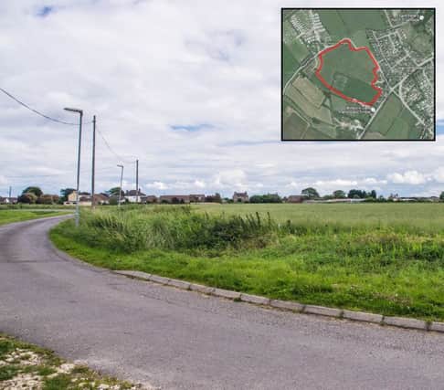 The site of the proposed caravan park. (Inset: Satellite image of the site).