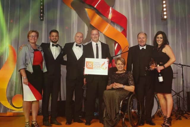 The artsNK Dance Development team receiving their ukactive and Matrix Flame Award. EMN-160718-105534001