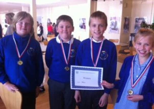 Pupils from Mrs Mary King's Primary School triumph in the Junior Mathematical Challenge. EMN-160714-145503001