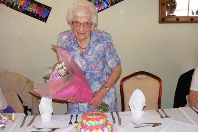 Prolific knitter Nancy Smith at her 95th birthday. party. EMN-160718-181900001