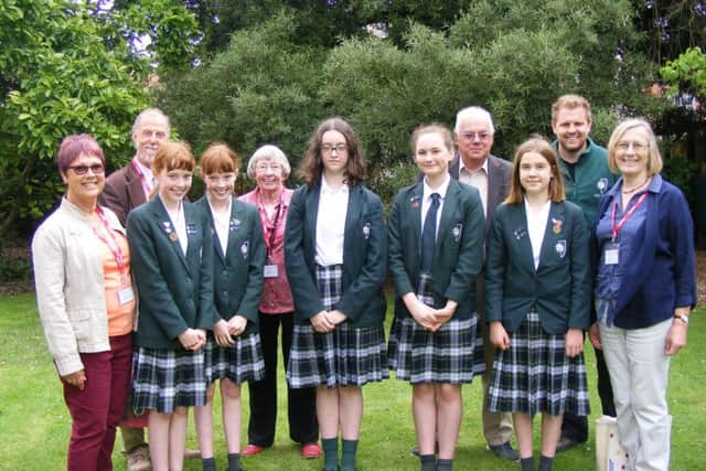 Judges meet the High Schools Eco Ambassadors and Sleaford in Bloom members. From left (back) Pauline Dobson, Jeff Bates (judge), Derek Bilby (judge) Thomas McGann (site team manager), Becky Mayfield, (front) Charlie and Stevie Scott, Jessica Pettini, Amber Parker-Worthy and Ava Newell. EMN-160714-163629001