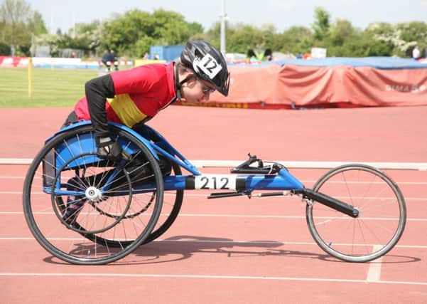 Wheelchair athlete Joel James on the track. EMN-160715-113445001