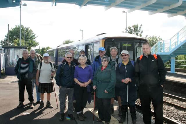Ramblers at Brigg Station with Stuart Parker (2nd right) Area Secretary of Lincolnshire Ramblers and Paul Johnson Chair of the Friends of the Brigg and Kirton Lindsey Line Group (right). EMN-160713-174437001