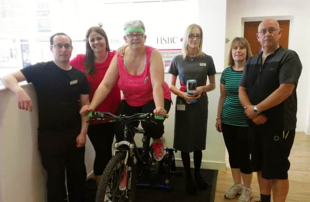 Staff at the Louth branch of HSBC bank are 'keeping fit' this week to raise funds for dementia.