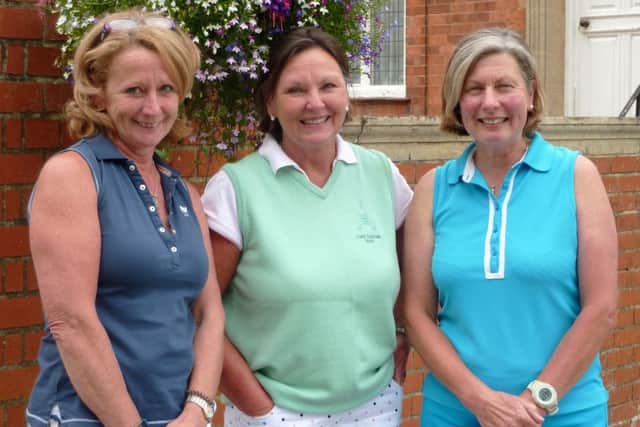 Ladies Invitation Day winners Sue Fisher (left) and Rachel Barton (right) with lady captain Penny Buckley EMN-160718-151532002