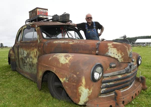 Bullfrog Bash at Sleaford Rugby Club. Richard Millard of Metheringham with his 1946 Ford Coupe Deluxe. EMN-160722-113919001