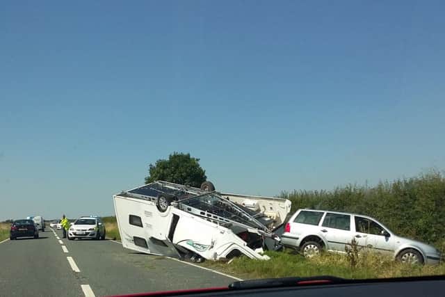 Wreckage. The overturned caravan on the A15. Photo by Neil Parnham. EMN-160720-085758001