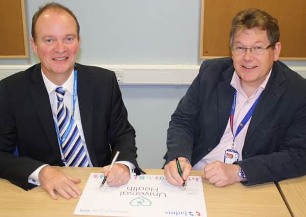 Back in April 2015 when  Dr John Brewin (left), Chief Executive of Lincolnshire Partnership NHS Foundation Trust and Dr Neal Parkes (right), Chief Executive of Lincolnshire and District Medical Services signed the Universal Health partnership to take charge of the Metheringham GP surgery. EMN-160722-102850001