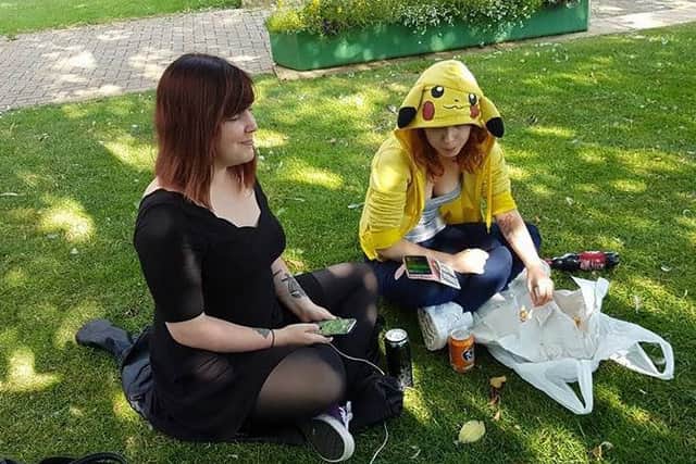 Pokemon Go 'lure party' - goers in Sleaford on Friday evening. EMN-160725-102059001