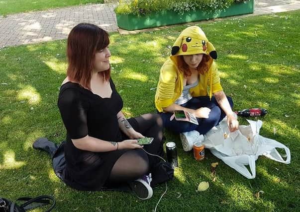 Pokemon Go 'lure party' - goers in Sleaford on Friday evening. EMN-160725-102059001