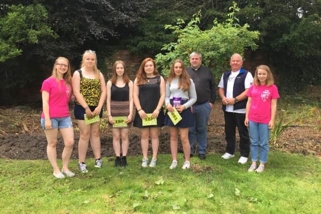 One of Lincolnshire's NCS teams in Louth last week, alongside Rector of Louth Rev Nick Brown.
