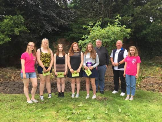One of Lincolnshire's NCS teams in Louth last week, alongside Rector of Louth Rev Nick Brown.