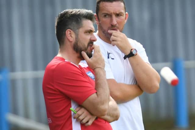 Nathan Collins (right) with Daryl Clare.