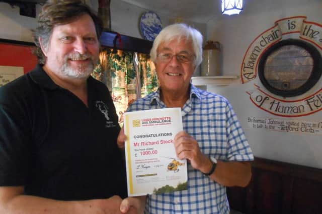 Richard Stockdale (left) landlord of The White Hart Inn at Tetford pictured with Paul Croft, trustee and vice chairman of the Lincs and Notts Air Ambulance Trust.