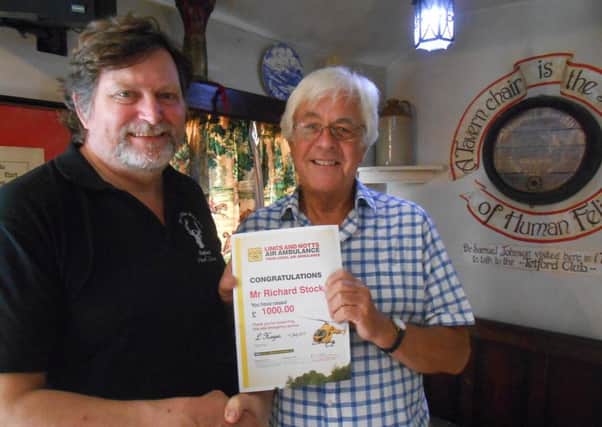 Richard Stockdale (left) landlord of The White Hart Inn at Tetford pictured with Paul Croft, trustee and vice chairman of the Lincs and Notts Air Ambulance Trust.