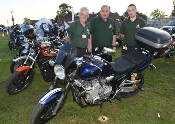 Wolds Bikers' charity event at Billinghay. L-R Ian Carroll, Lee Knowles and Martin Jess of LIVES. EMN-160729-152830001