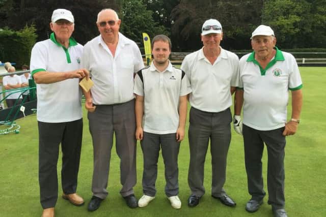 Pictured with Jubilee Park chairman Bernie Buck (far left) and tournament organiser Frank Manley (far right), East Lindsey District Triples winners Sleaford are, from left  Harry Spencer, Paul Oke and Terry Ingham.