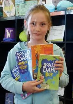 Mallory Marchall is the first to complete the Big friendly Read at Caistor. EMN-160708-121335001
