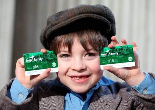 Darragh McCormick, seven, with a pair of Leap family cards. EMN-160308-174552001