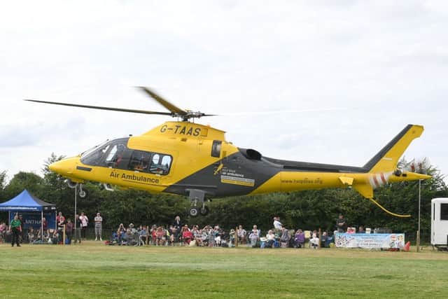 149th Heckington Show. Air Ambulance in the main arena. EMN-160108-120541001